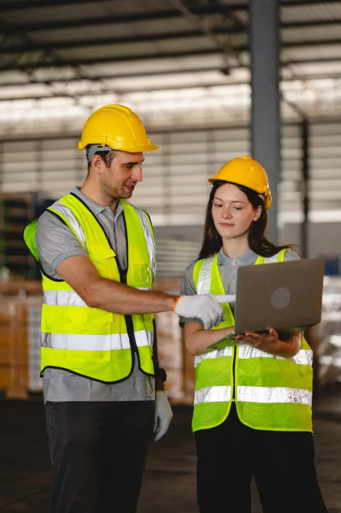 professional technician engineer working in industrial manufacturing factory